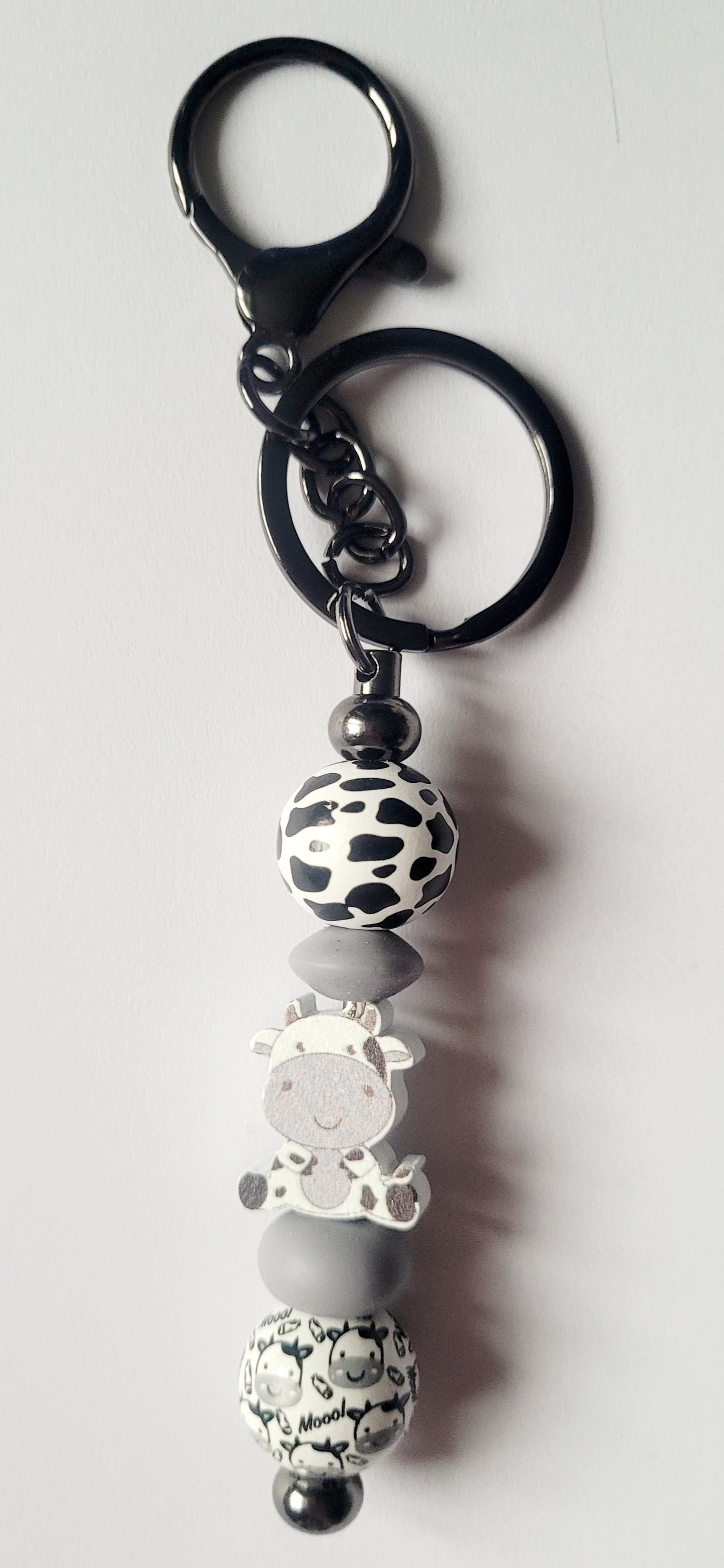 Grey 'Sitting Cow' Wooden Keyring