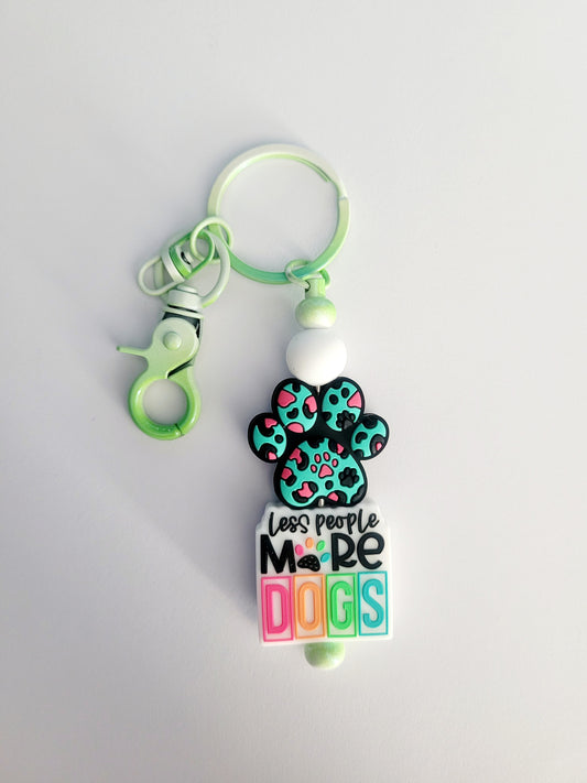 'Less People, More Dogs' Beaded Green Metal Keyring